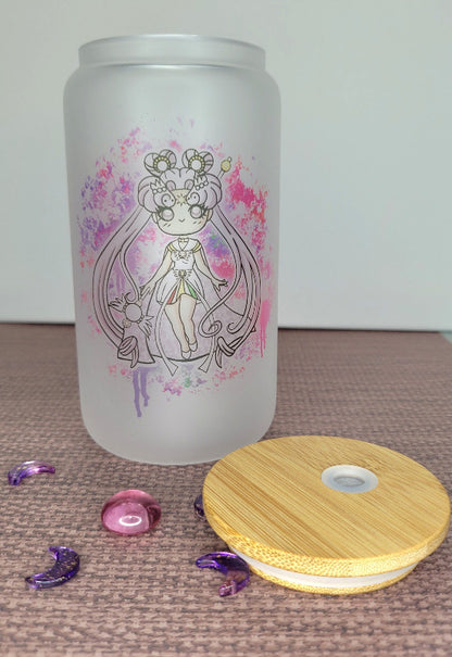 A 20 oz frosted glass cup featuring the iconic Sailor Cosmos. This captivating design showcases Sailor Cosmos in all her celestial beauty, adorned with intricate details and vibrant colors. The frosted glass adds a touch of elegance to the cup, making it a stunning addition to any collection. Embrace the magic of Sailor Cosmos with this enchanting frosted glass cup.