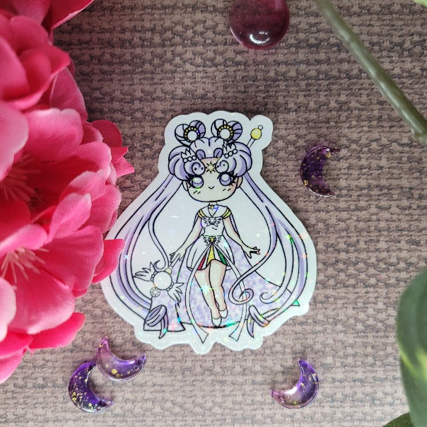 A vibrant 3-inch Sailor Cosmos vinyl sticker showcasing the powerful Sailor Cosmos character. With a celestial background and a graceful pose, Sailor Cosmos stands tall, radiating strength and determination. The sticker features intricate details and vivid colors, capturing the essence of the Sailor Moon universe. This sticker is perfect for fans of the series, adding a touch of cosmic beauty to any surface it adorns.