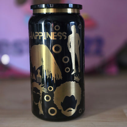 Black cup with gold design and 'Happiness' text on a blurred background