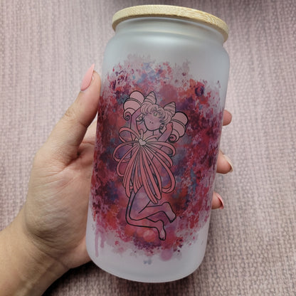 "16 oz frosted Sailor Chibimoon cup with bamboo lid - a clear cup with a frosted finish featuring Sailor Chibimoon character artwork. The cup has a capacity of 16 oz and is topped with a bamboo lid to prevent spills and keep drinks hot or cold."