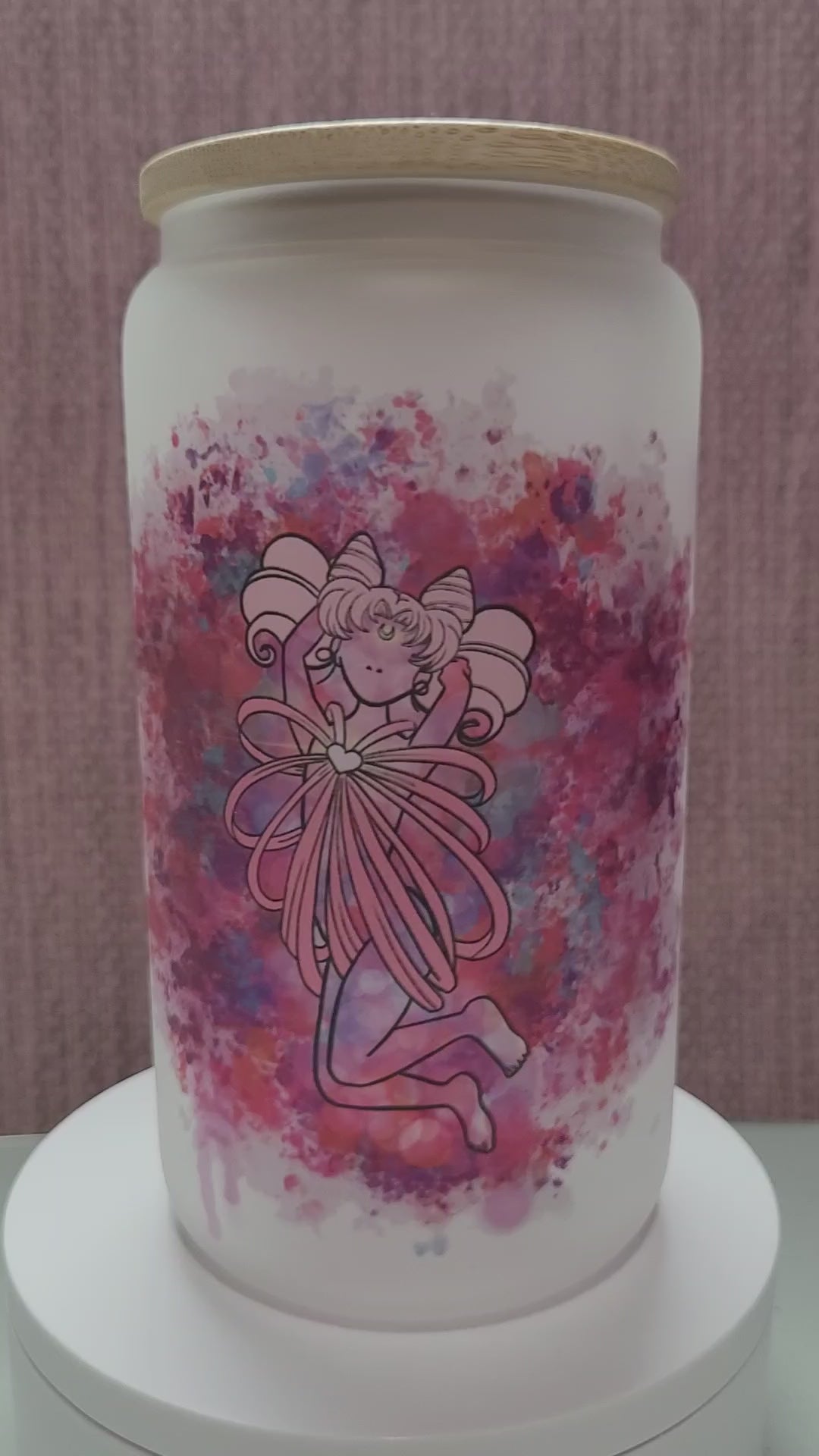 "16 oz frosted Sailor Chibimoon cup with bamboo lid - a clear cup with a frosted finish featuring Sailor Chibimoon character artwork. The cup has a capacity of 16 oz and is topped with a bamboo lid to prevent spills and keep drinks hot or cold."